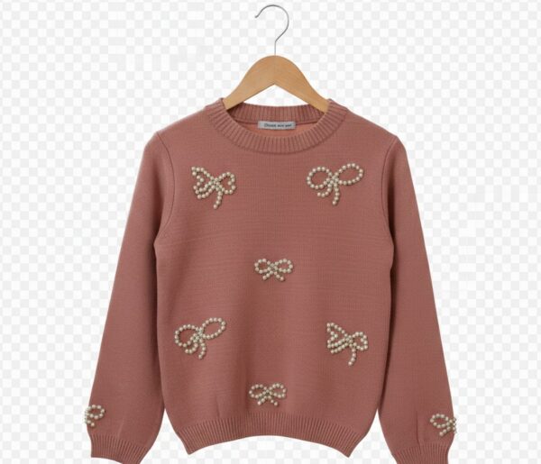 Pull rose poudré à nœuds perlés – Élégance féminine